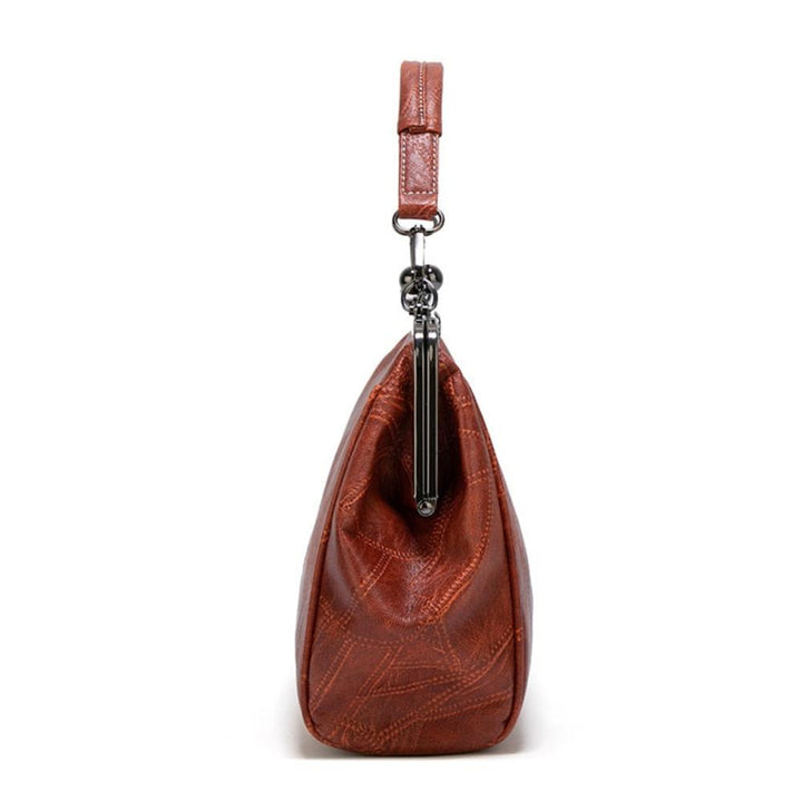 Mila | Vintage handbag with flap closure