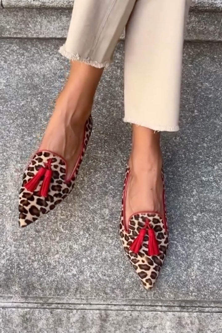 SAVINA | Elegant pointed toe loafers with fringed details for a refined look