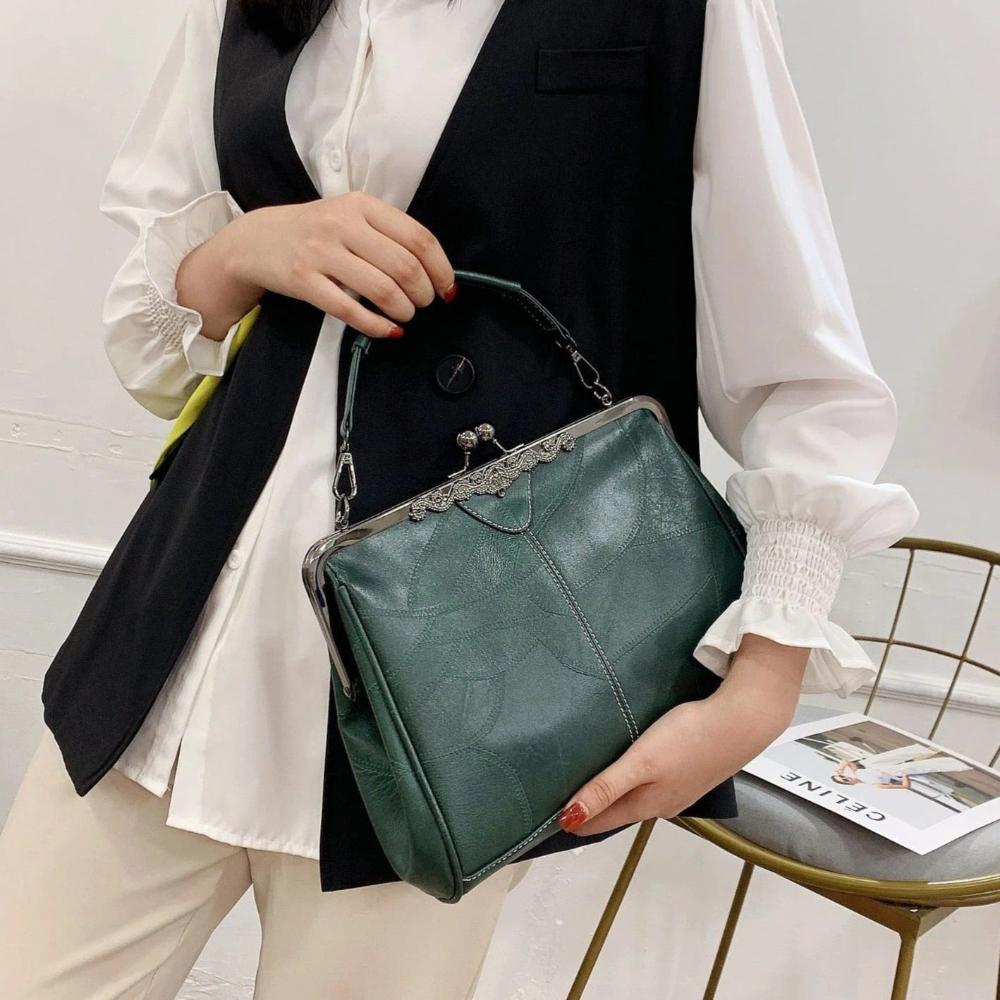 Mila | Vintage handbag with flap closure
